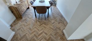 Polyflor Camaro luxury vinyl tiles in colour Cambridge Parquet supplied & fitted to Lounge/Diner & Kitchen.