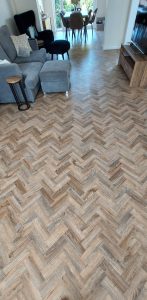 Polyflor Camaro luxury vinyl tiles in colour Cambridge Parquet supplied & fitted to Lounge/Diner & Kitchen.