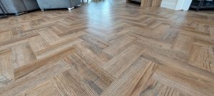 Polyflor Camaro luxury vinyl tiles in colour Cambridge Parquet supplied & fitted to Lounge/Diner & Kitchen.