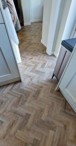 Polyflor Camaro luxury vinyl tiles in colour Cambridge Parquet supplied & fitted to Lounge/Diner & Kitchen.